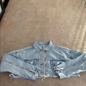 Super cropped distressed denim jacket